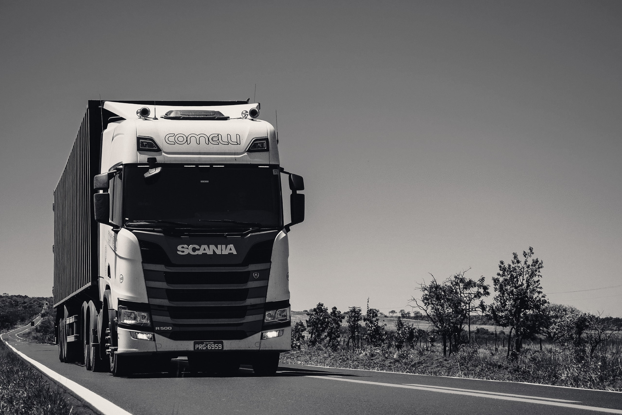 Freight truck driving along an open road