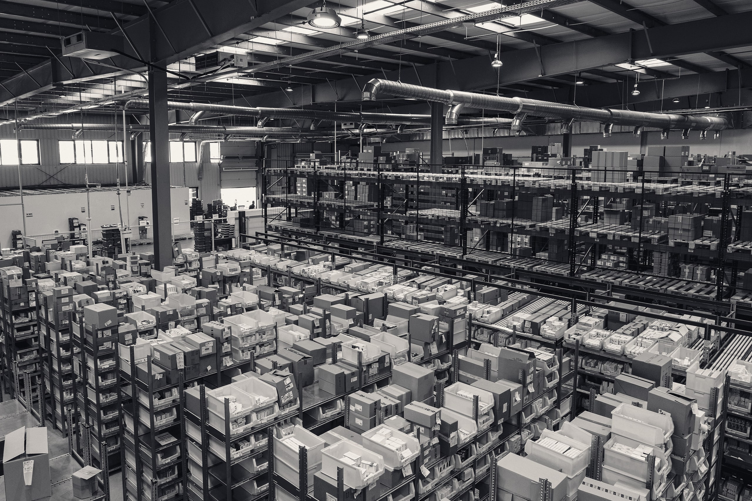 Warehouse shelving stacked with boxes